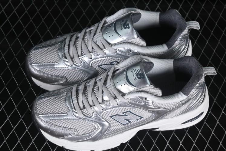 NB 530 "Grey Matter Silver Metallic"